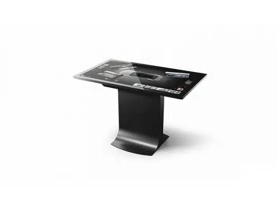 55 Zoll 4K/UHD Touch Table Screensource IET55 with a black pedestal base, featuring a sleek rectangular touchscreen displaying a digital user interface and vibrant images. Modern interactive touchscreen table ideal for presentations, education, or collaborative workspaces.