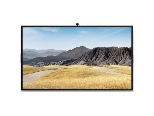 Samsung flat screen TV displaying a vivid landscape with dry yellow grass in the foreground, rugged rocky mountains in the middle, and a clear blue sky with wispy clouds in the background. Ideal for showcasing high-definition home entertainment visuals.