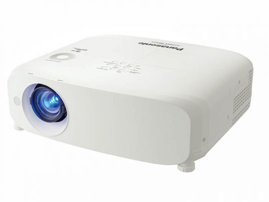 Panasonic white projector with blue lens, top-mounted buttons and labels, and side ventilation grills, displayed on a plain white background.