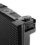 Close-up image of Unilumin URMIII 2.6 MK2 Pro LED wall module, showing a 2.6mm pixel pitch grid of tiny LED lights and a section of the sturdy metal frame with visible attachment and mounting mechanisms for seamless video wall installation.