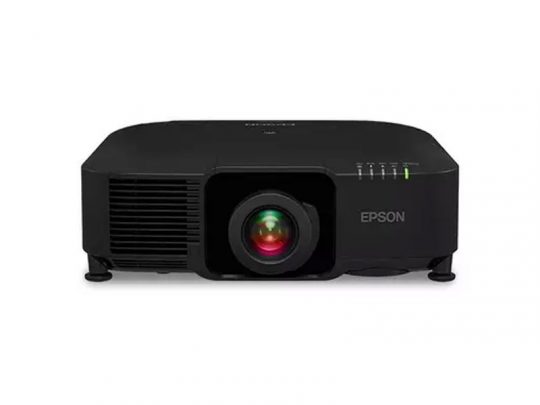 Black Epson projector facing forward on a plain white background, displaying its prominent lens with colored reflections, indicator lights on the right, and sleek design with ventilation grills on the left.