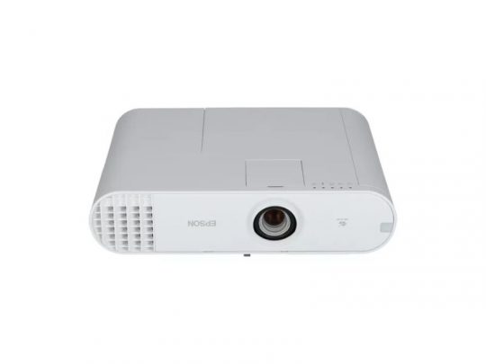 Front view of a white Epson projector, featuring a central lens and left-side ventilation grilles, displayed on a plain white background.