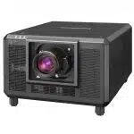 Panasonic PT-RQ35K projector: A robust, black 32,000 lumen 3-Chip DLP™ projector featuring a prominent central lens, large ventilation grilles on the sides, and sturdy legs for stability. The boxy design highlights its professional-grade build for high-brightness projection.