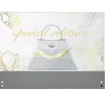 White geometric handbag with Special Edition in gold text, displayed on a gray base with floral line art in the background.