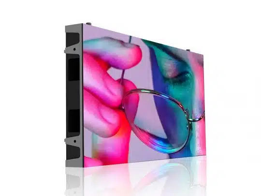 Rectangular LED display screen showing a close-up of a person holding eyeglasses near their face, illuminated by colorful pink, blue, and green lights on a white background. Perfect for advertising or digital signage with vibrant visuals.