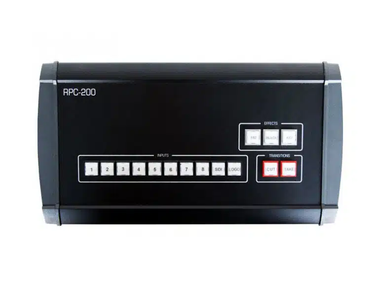 Barco RPC-200 Remote-Steuerung für PDS-902/DCS-200 mieten oder kaufen - schwarzer Video-Switcher mit nummerierten Eingabetasten, Funktionstasten und zwei großen CUT/TAKE-Tasten, abgebildet auf weißem Hintergrund. Ideal für professionelle Videoregie.