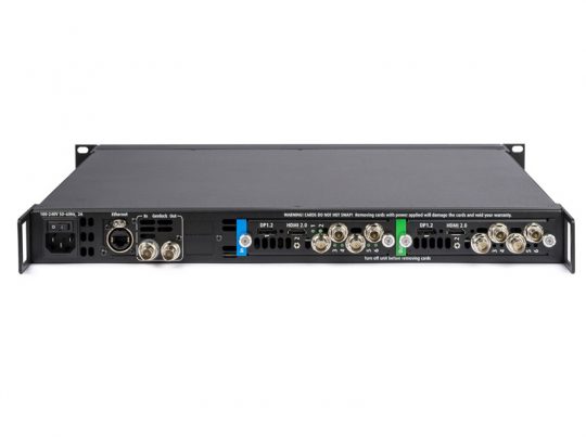 Barco ImagePRO-4K Präsentations-Scaler, rack-montierbares schwarzes Gerät mit zahlreichen Audio- und Video-Anschlüssen sowie Beschriftungen auf der Rückseite, zur Miete erhältlich. Ideal für professionelle AV-Anwendungen.