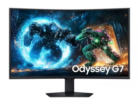 Der gebogene Samsung Odyssey G7-Monitor zeigt ein farbenfrohes Bild mit zwei kämpfenden, futuristischen Robotern – einer leuchtet blau, der andere grün – vor einem dynamischen Sci-Fi-Hintergrund.