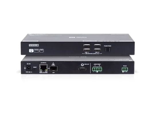 Auf dem Bild sind zwei übereinander gestapelte schwarze Industrie-Switches zu sehen. Sie verfügen über verschiedene Anschlüsse wie USB, HDMI, RS-232, Ethernet, SFP-Ports sowie grüne Klemmenleisten und Funktionstasten. Die Geräte sind mit technischen Beschriftungen versehen und eignen sich für professionelle Netzwerkanwendungen.